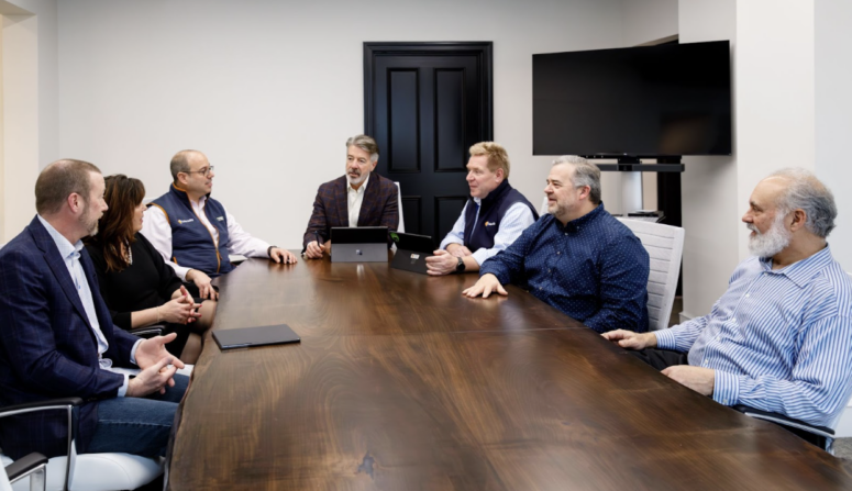 Meradia conducting a round table.